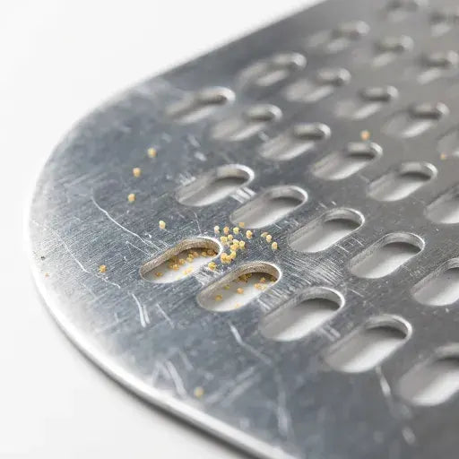 Pelle à pizza perforée professionnelle